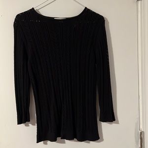 Amanda Smith black sweater